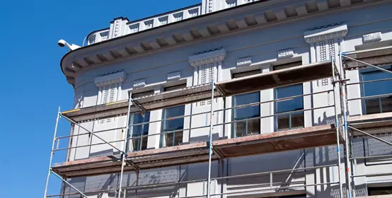 Scaffolding near the facade of a building for restoration.