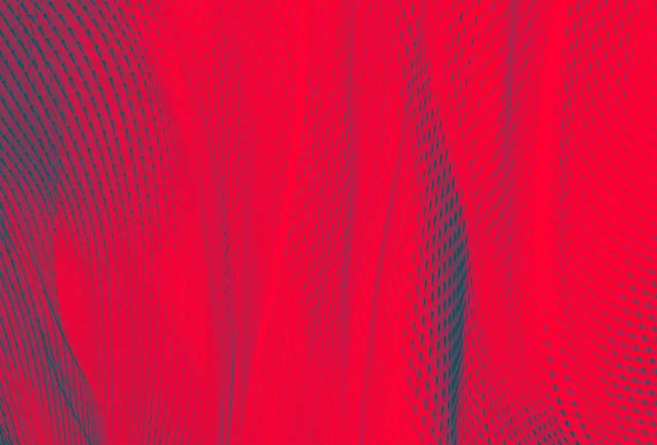 Blurred motion of lights creating abstract fabric effect - red texture