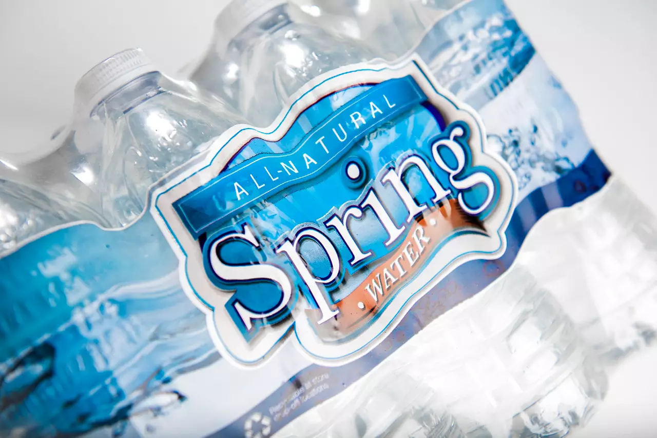 Package of spring water in recycled plastic