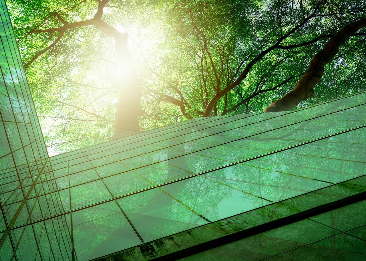 Sustainble green building. Eco-friendly building. Sustainable gl