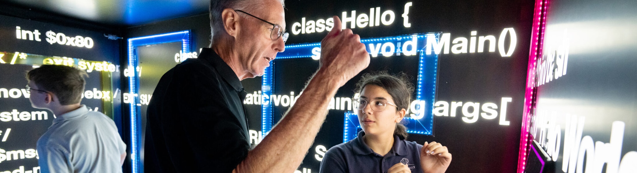 Jim Fitterling speaking with a student at Creators Wanted event in Louisiana